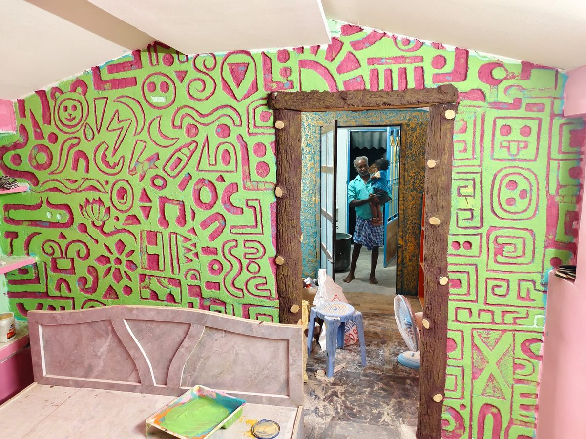Bold abstract graffiti-style relief pattern in green and pink